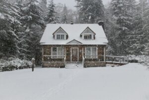 House covered in snow during winter.